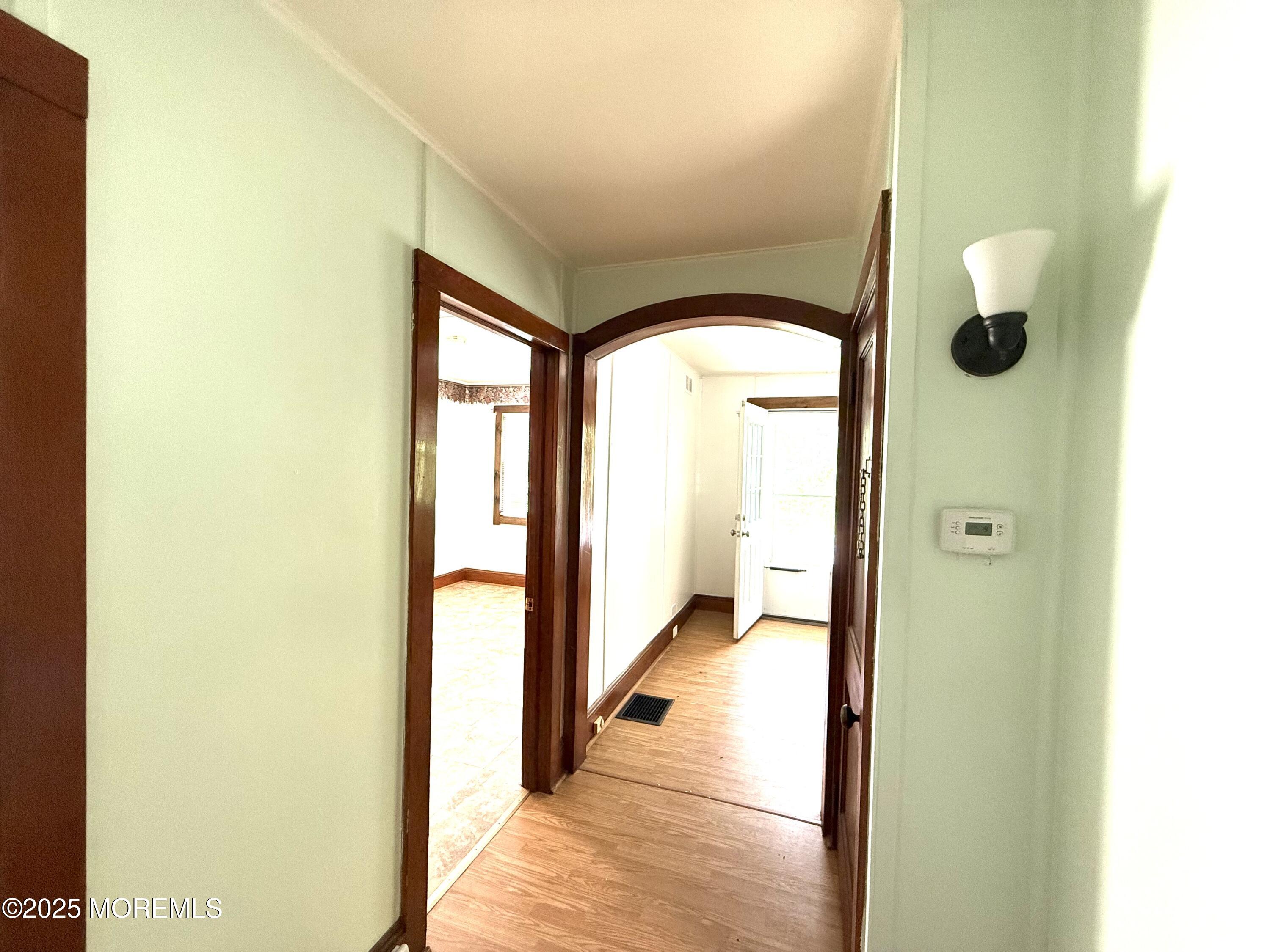 155 Wells Mill Road Waretown, NJ 08758 - Photo 5 of 37 hall to kitchen & bedrm