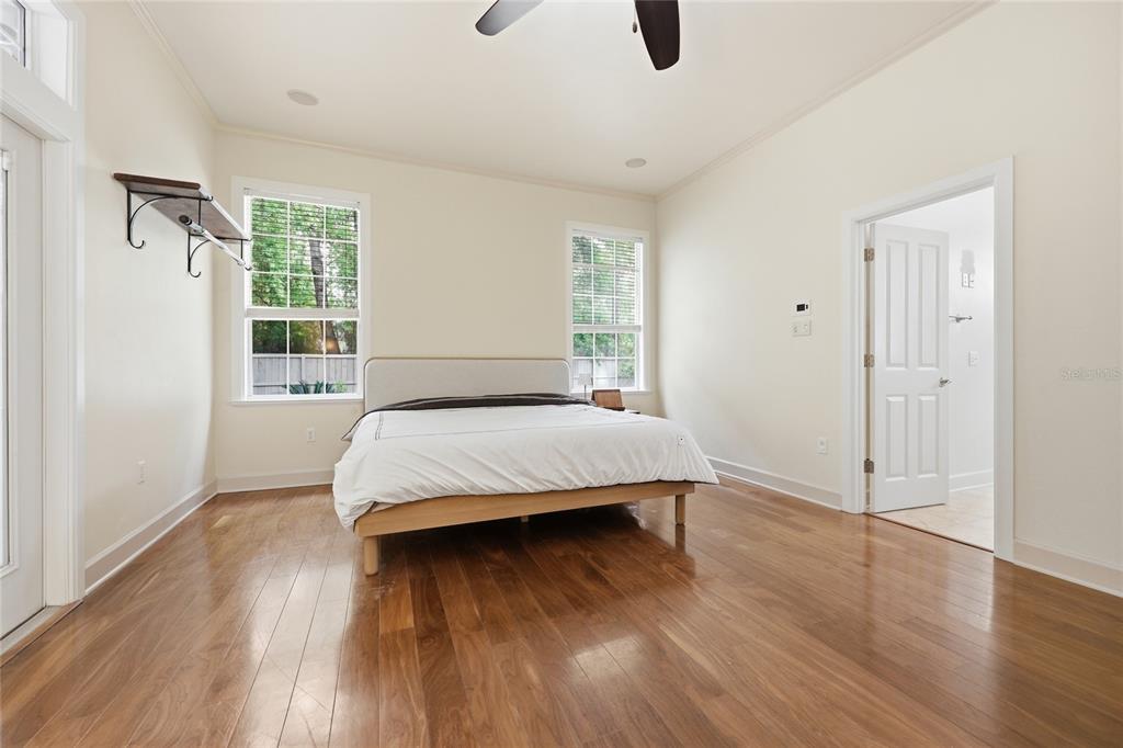 9255 Southwest 29 Avenue Gainesville, FL 32608 - Photo 24 of 79 a bedroom with a bed and a window