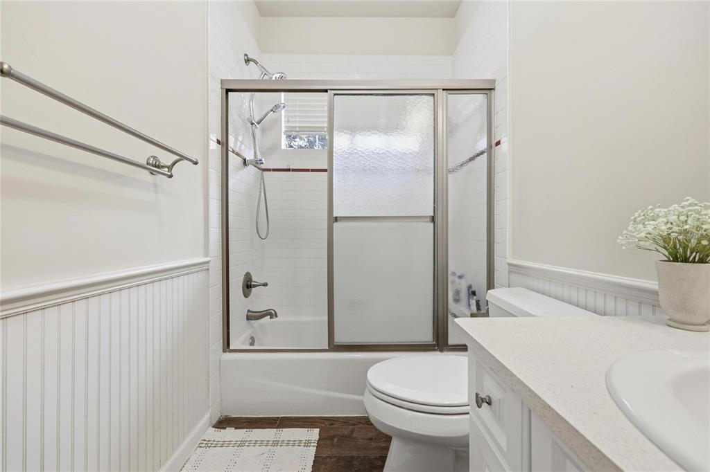 9255 Southwest 29 Avenue Gainesville, FL 32608 - Photo 54 of 79 a bathroom with a sink toilet and shower