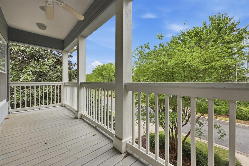 9255 Southwest 29 Avenue Gainesville, FL 32608 - Photo 59 of 79 a view of a balcony with wooden floor