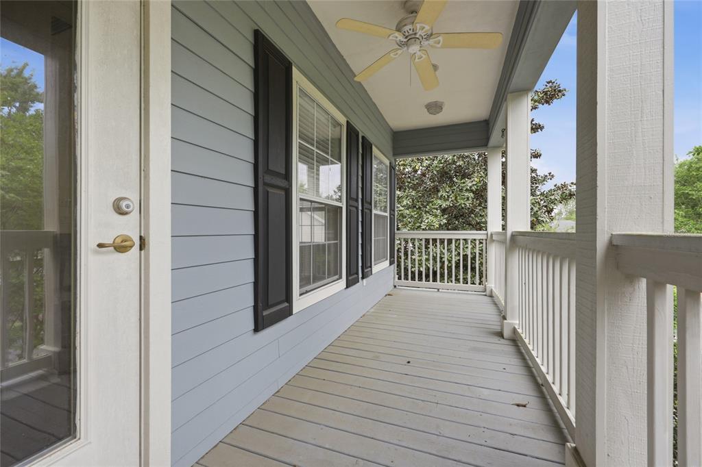 9255 Southwest 29 Avenue Gainesville, FL 32608 - Photo 60 of 79 a view of a porch with wooden floor and outdoor space
