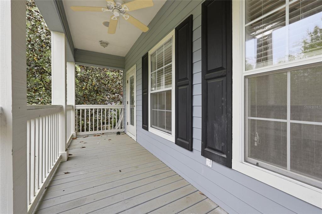 9255 Southwest 29 Avenue Gainesville, FL 32608 - Photo 62 of 79 a view of a balcony with wooden floor