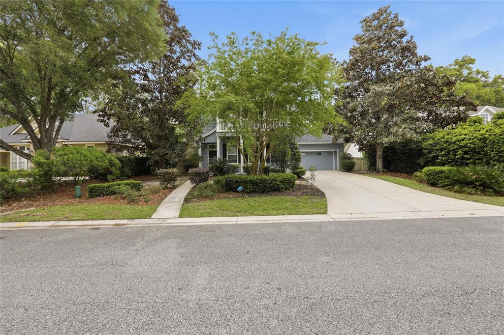 9255 Southwest 29 Avenue Gainesville, FL 32608 - Photo 67 of 79 a view of swimming pool with a yard and large trees