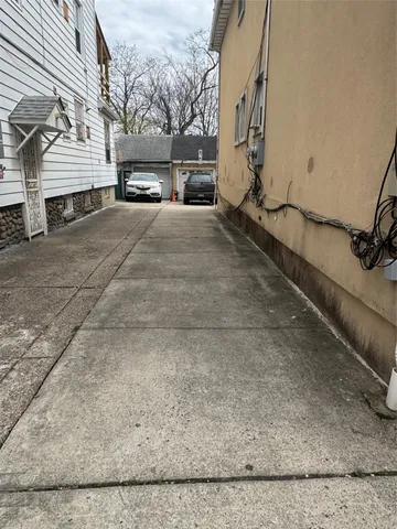 a view of a building with a road