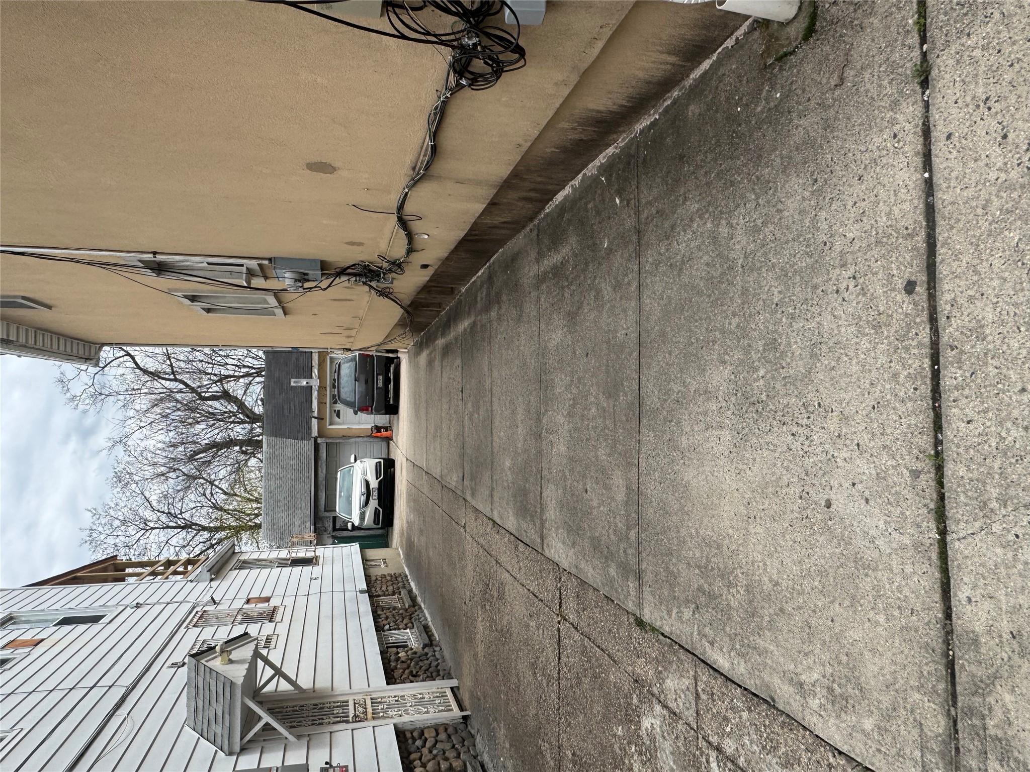 16116 Normal Road Queens, NY 11432 - Photo 3 of 5 a view of a building with a road