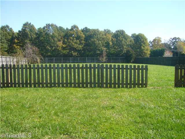 2810 Norwell Court Oak Ridge, NC 27310 - Photo 11 of 14 Land/Lot. The backyard actually has two fenced areas with one of the areas close to the home and the much larger area beyond. This allows great flexibility should someone have pets.