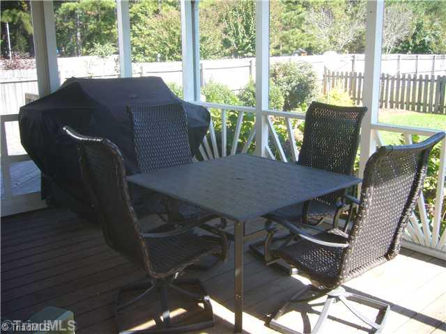 2810 Norwell Court Oak Ridge, NC 27310 - Photo 10 of 14 Enclosed Porch. The screened porch overlooks the fenced backyard & is wonderful space for most of the months of the year to just relax & enjoy the outdoors! There is plenty of outdoor space for the grill to be moved outside to take advantage of the full enclosed area.