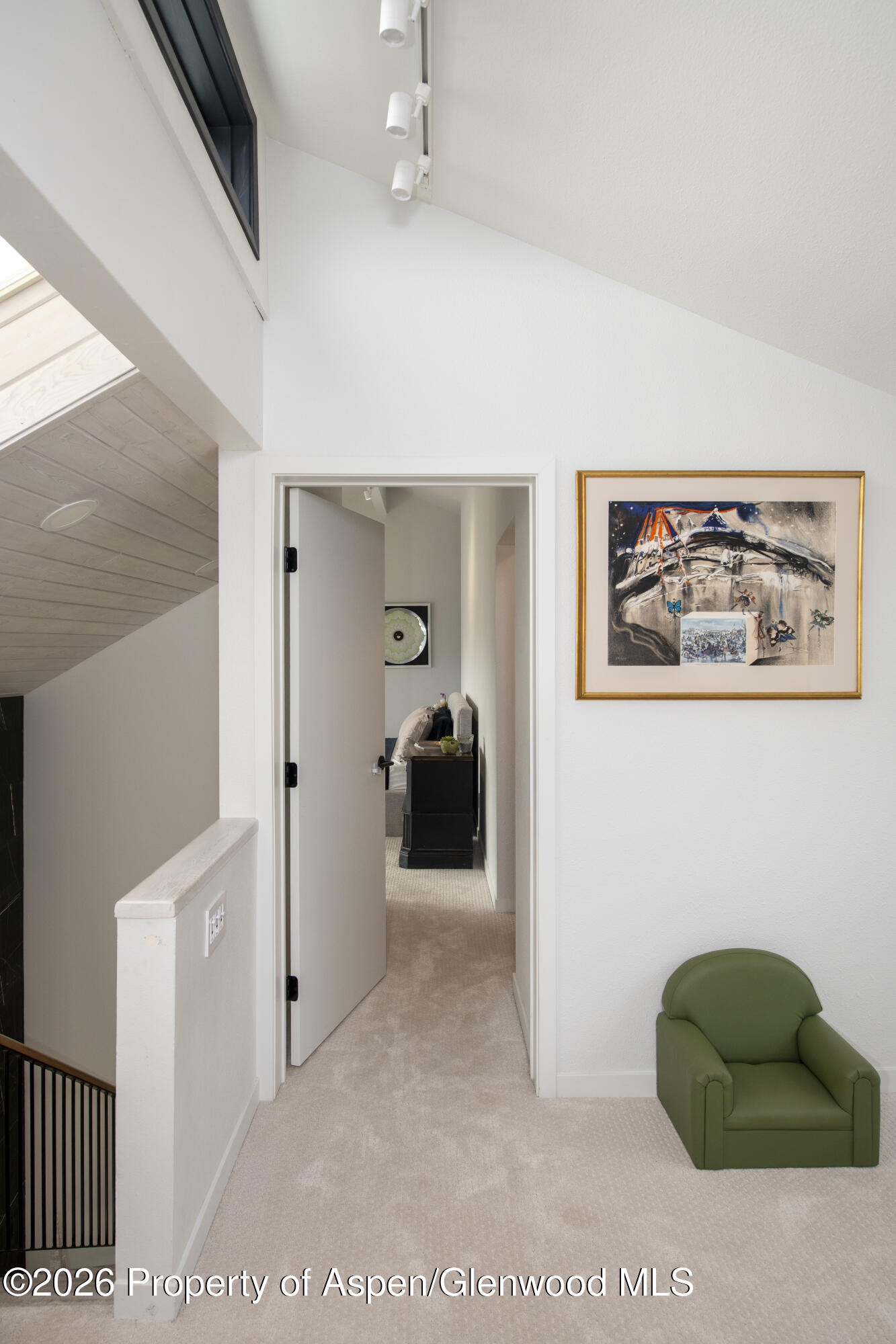 450 Solar Way Aspen, CO 81611 - Photo 13 of 51 a living room with furniture and a chandelier