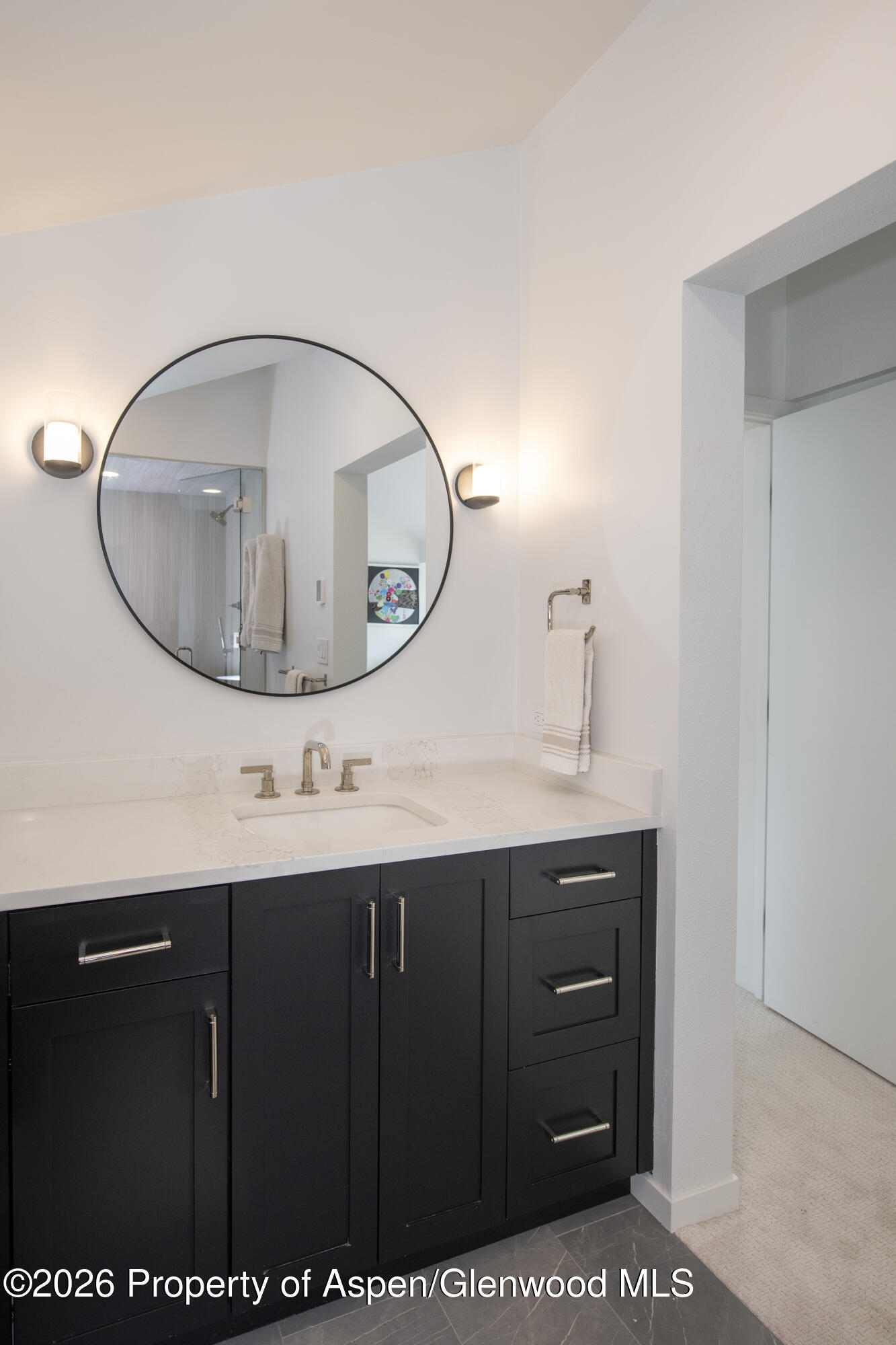 450 Solar Way Aspen, CO 81611 - Photo 20 of 51 a bathroom with a sink a vanity and a mirror