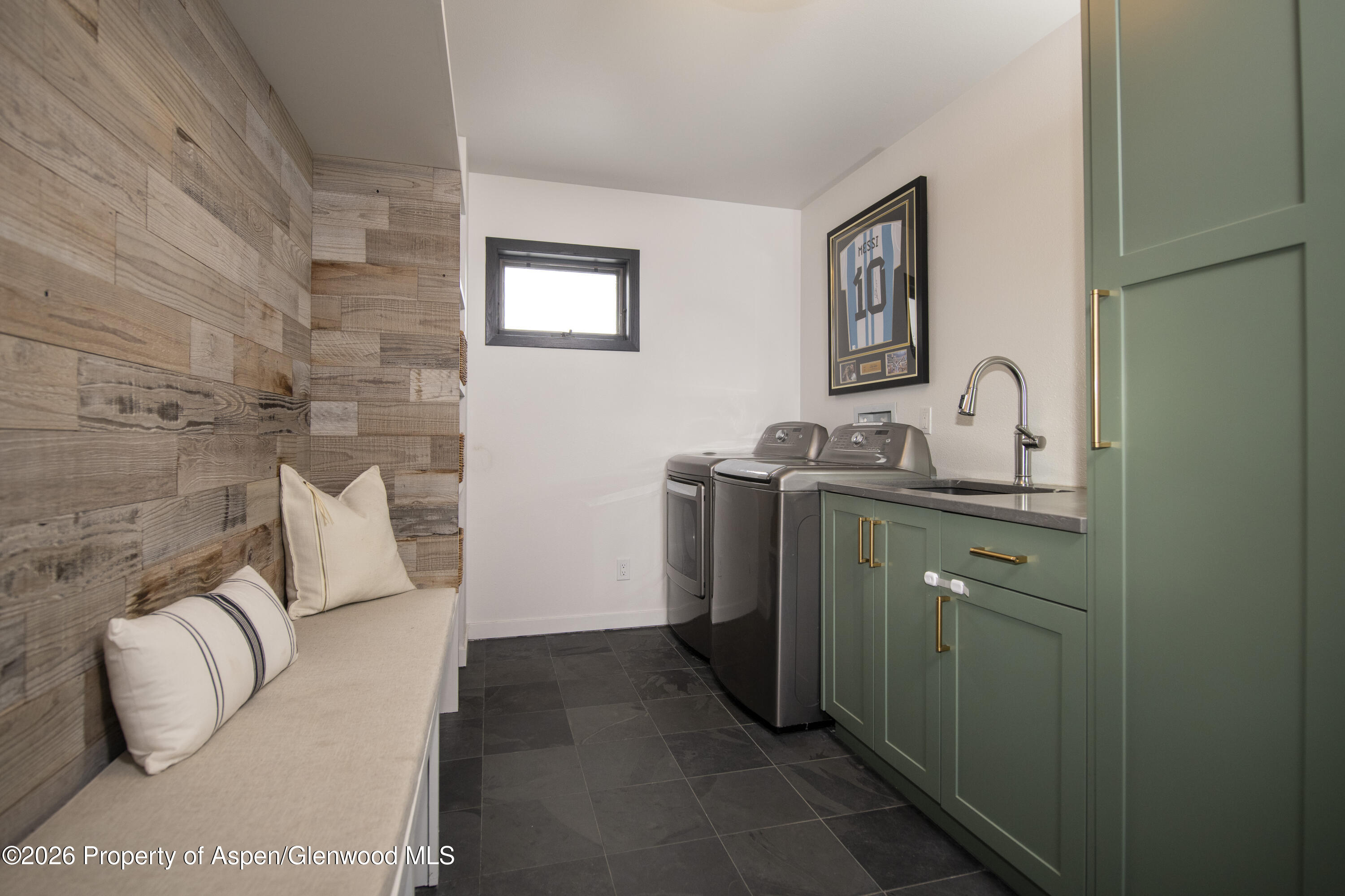 450 Solar Way Aspen, CO 81611 - Photo 34 of 51 a bathroom with a sink and a mirror