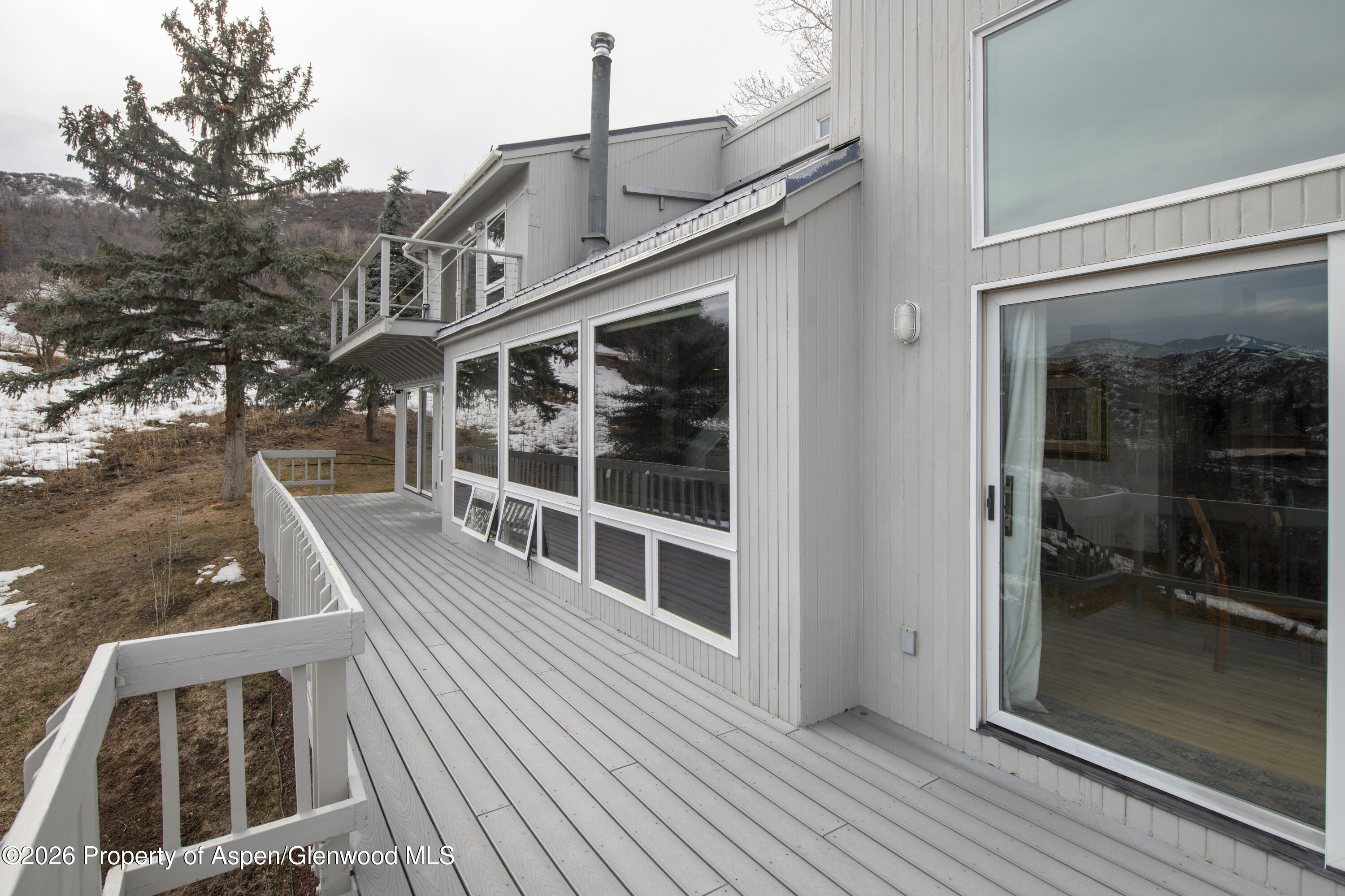 450 Solar Way Aspen, CO 81611 - Photo 42 of 51 a view of a house with a balcony