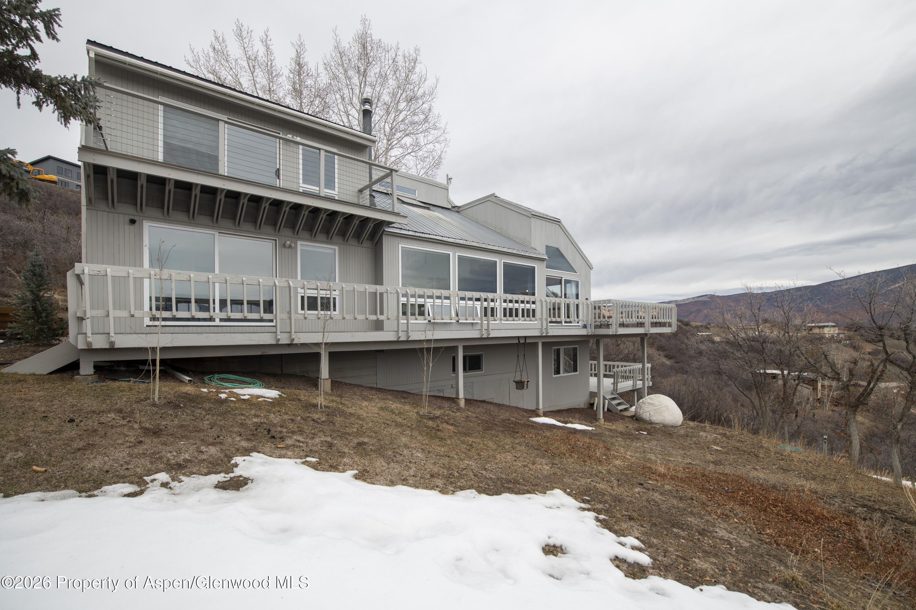 450 Solar Way Aspen, CO 81611 - Photo 43 of 51 a view of a building with a large window