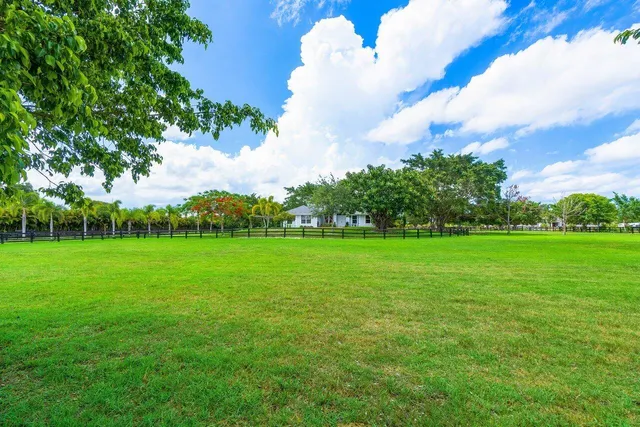 a view of a lake with a yard
