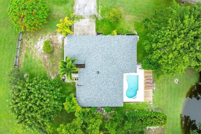 a view of a garden with a lake