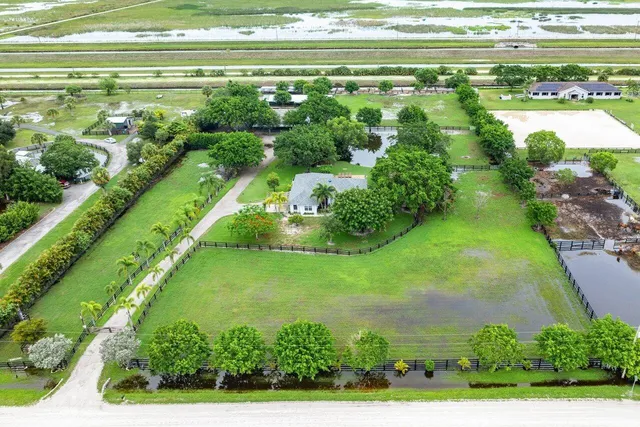 a view of a lake with a yard