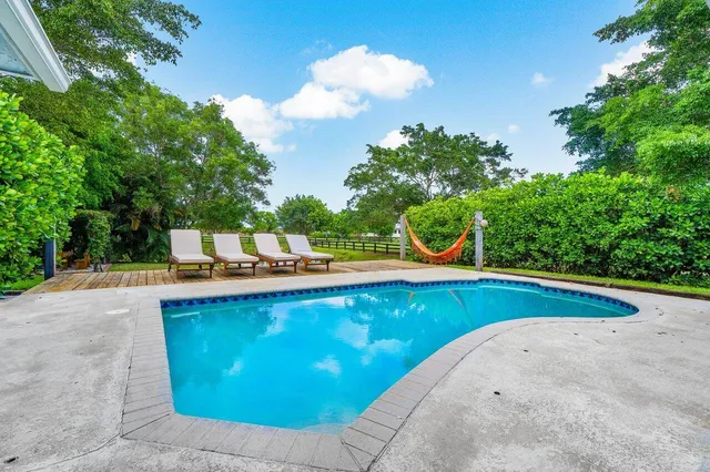 a bath room with a bath tub and a shower