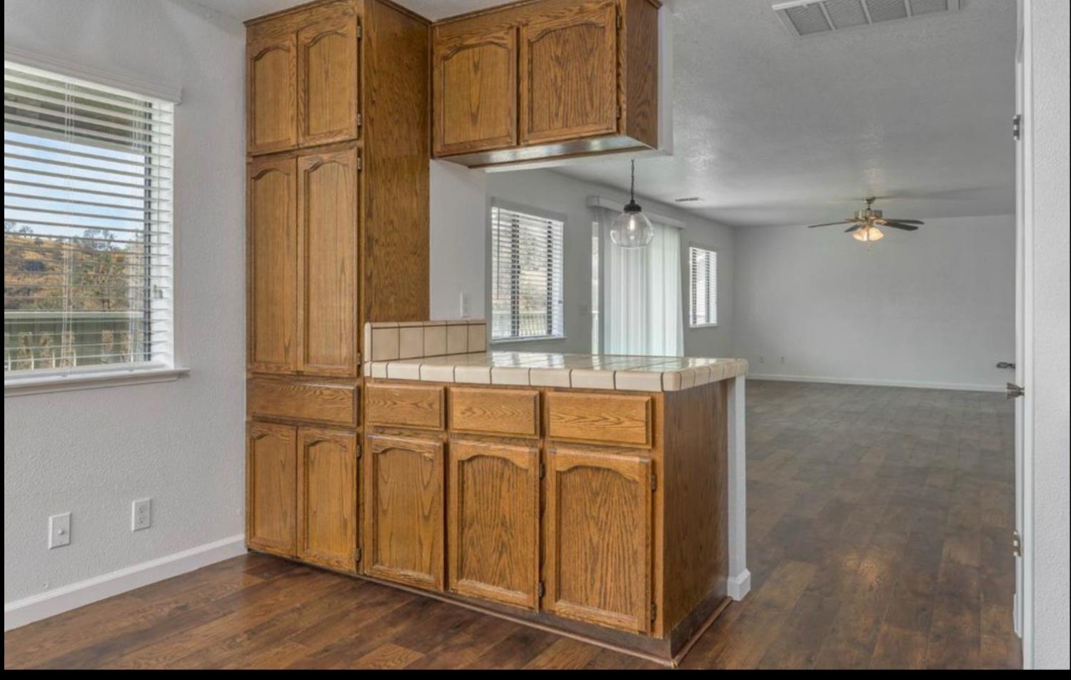 27817 Sky Harbour Road Friant, CA 93626 - Photo 12 of 36 a bathroom with a sink and a mirror