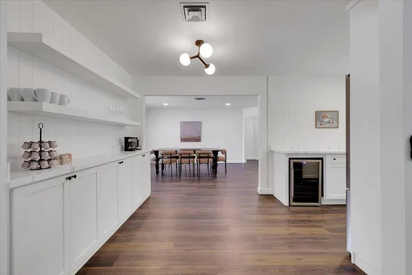 a view of a lake with outdoor seating