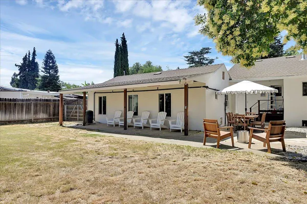 a backyard of a house with lots of green space