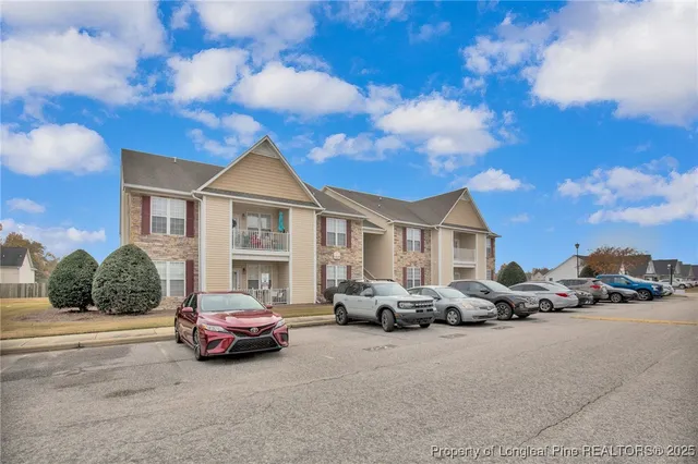 a cars parked in front of a house