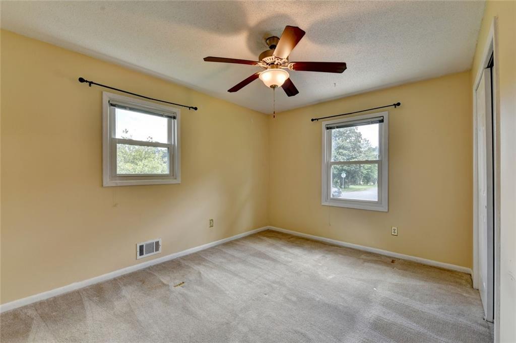 1577 Harbour Oaks Road Tucker, GA 30084 - Photo 33 of 58 a view of an empty room with a window