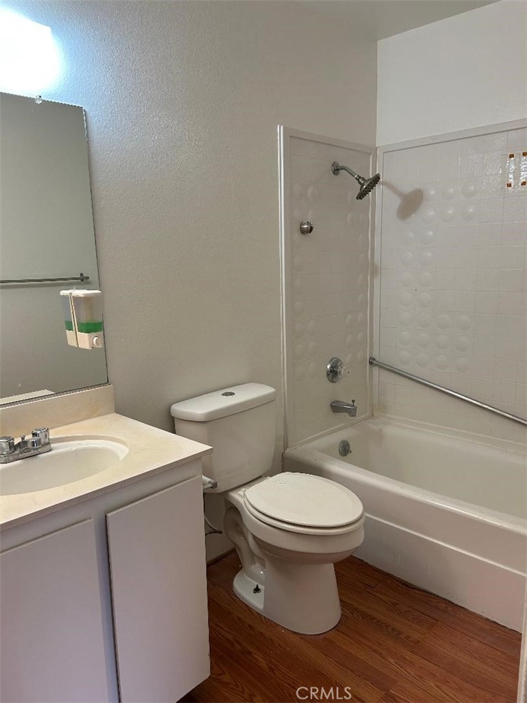 2255 Cahuilla Street, Unit 90 Colton, CA 92324 - Photo 11 of 12 a bathroom with a sink toilet and shower