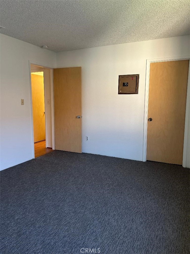 2255 Cahuilla Street, Unit 90 Colton, CA 92324 - Photo 12 of 12 a view of an empty room with a window