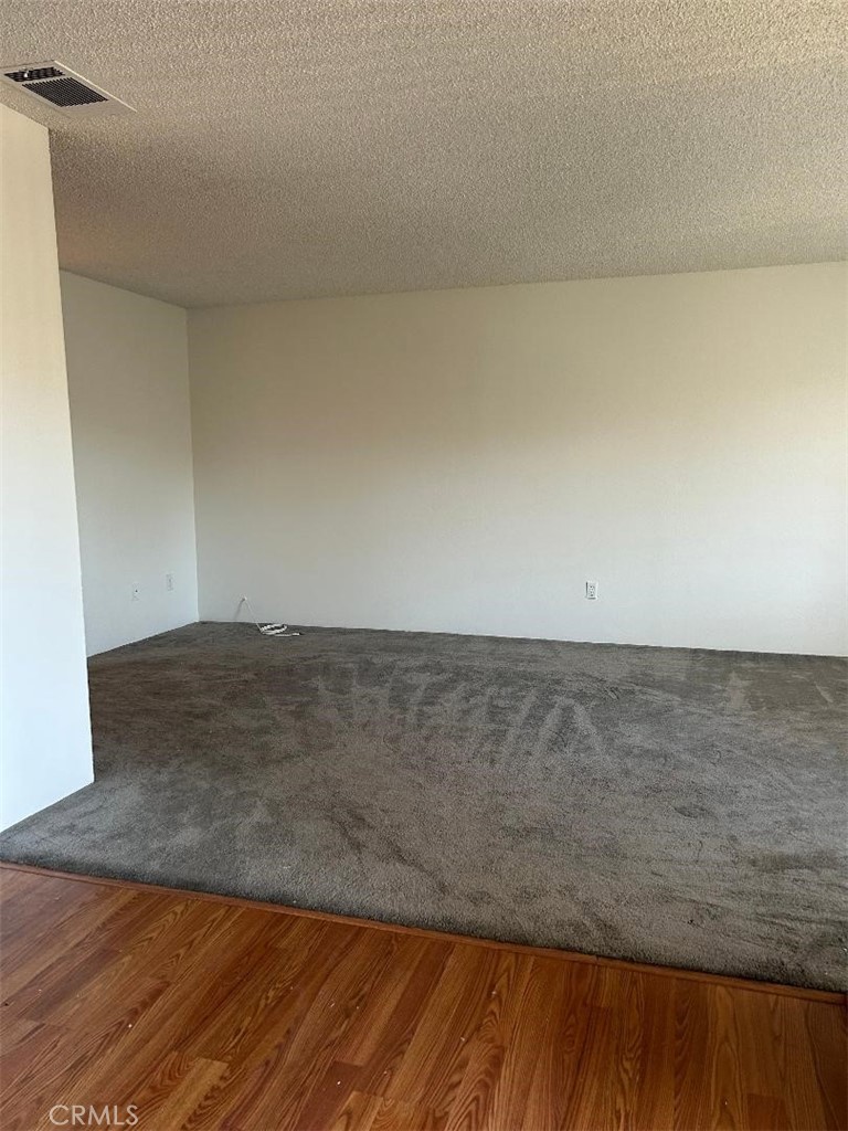 2255 Cahuilla Street, Unit 90 Colton, CA 92324 - Photo 3 of 12 a view of wooden floor