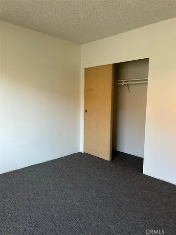an empty room with closet