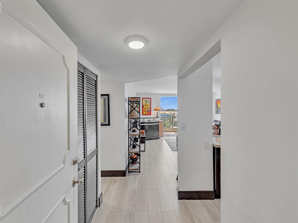 1421 South Ocean Boulevard, Unit 506 Pompano Beach, FL 33062 - Photo 3 of 36 a view of a kitchen and utility room
