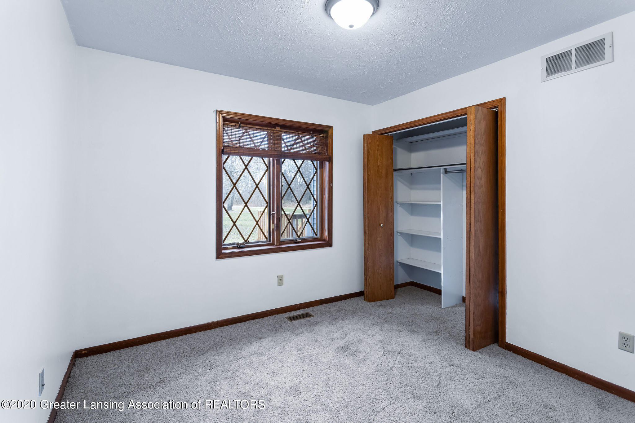 13065 Center Road Bath, MI 48808 - Photo 16 of 20 bedroom
