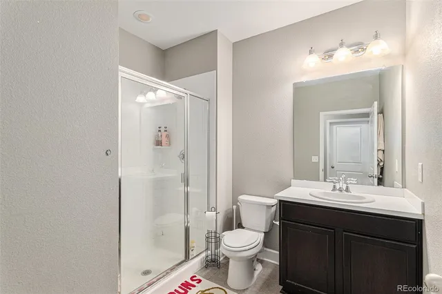 a view of swimming pool with sitting area