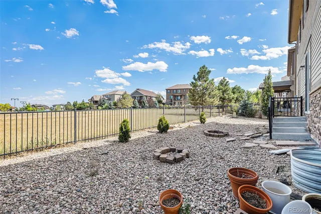 an aerial view of house with yard swimming pool and outdoor seating