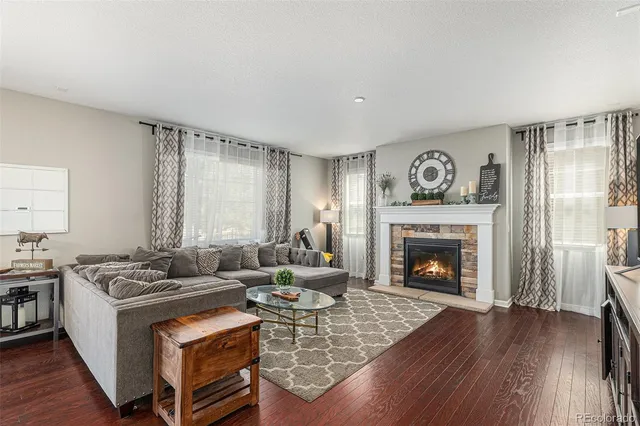 a view of a dining room with furniture and window