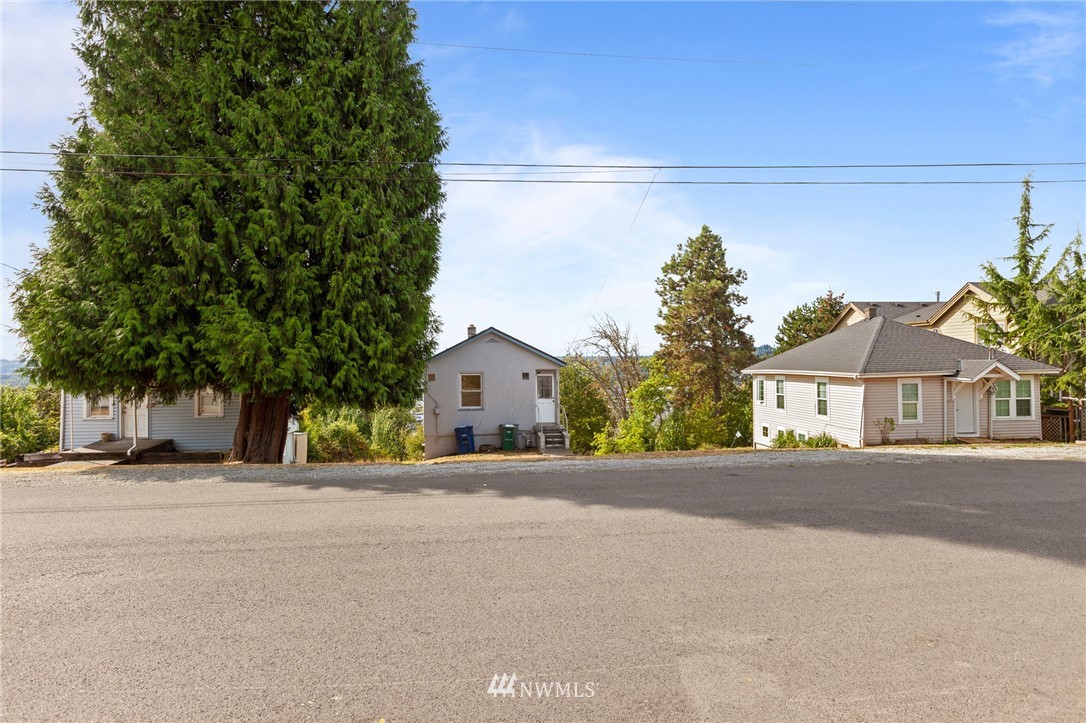 709 Renton Avenue South Renton, WA 98057 - Photo 3 of 13 front view of a house next to a road