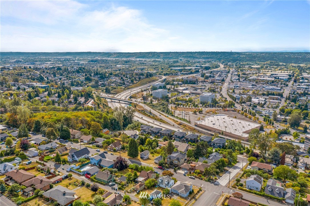 709 Renton Avenue South Renton, WA 98057 - Photo 7 of 13 an aerial view of residential building and lake view