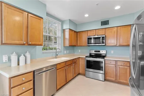 $730,000 | 1595 Winding Oaks Way, Unit 103, Naples, FL 34109