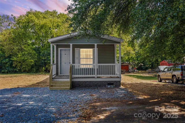 a view of a deck with a yard