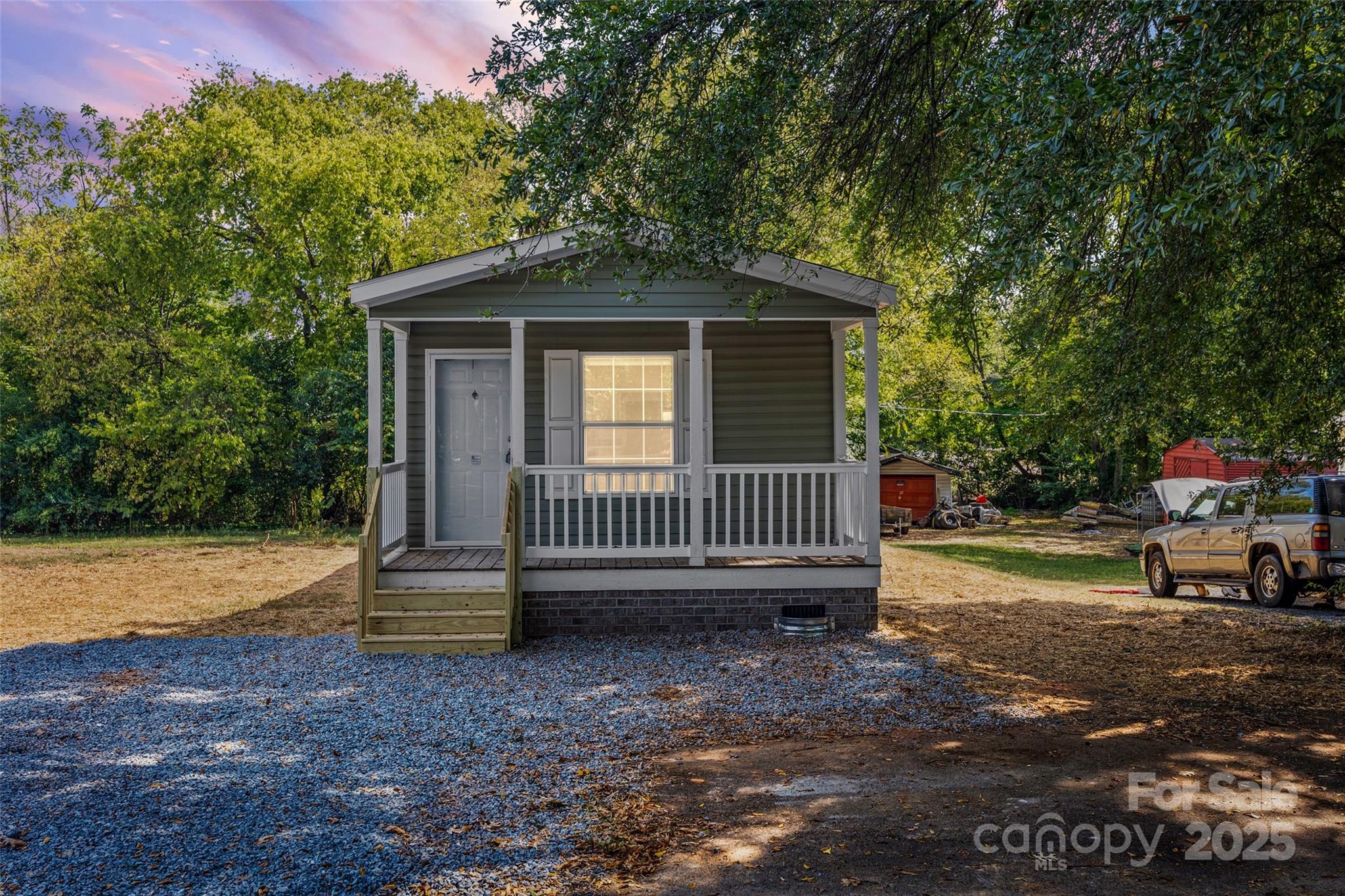 a view of a deck with a yard