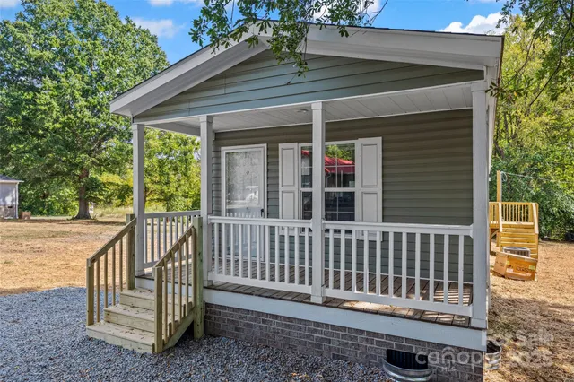 a view of a deck with a fence