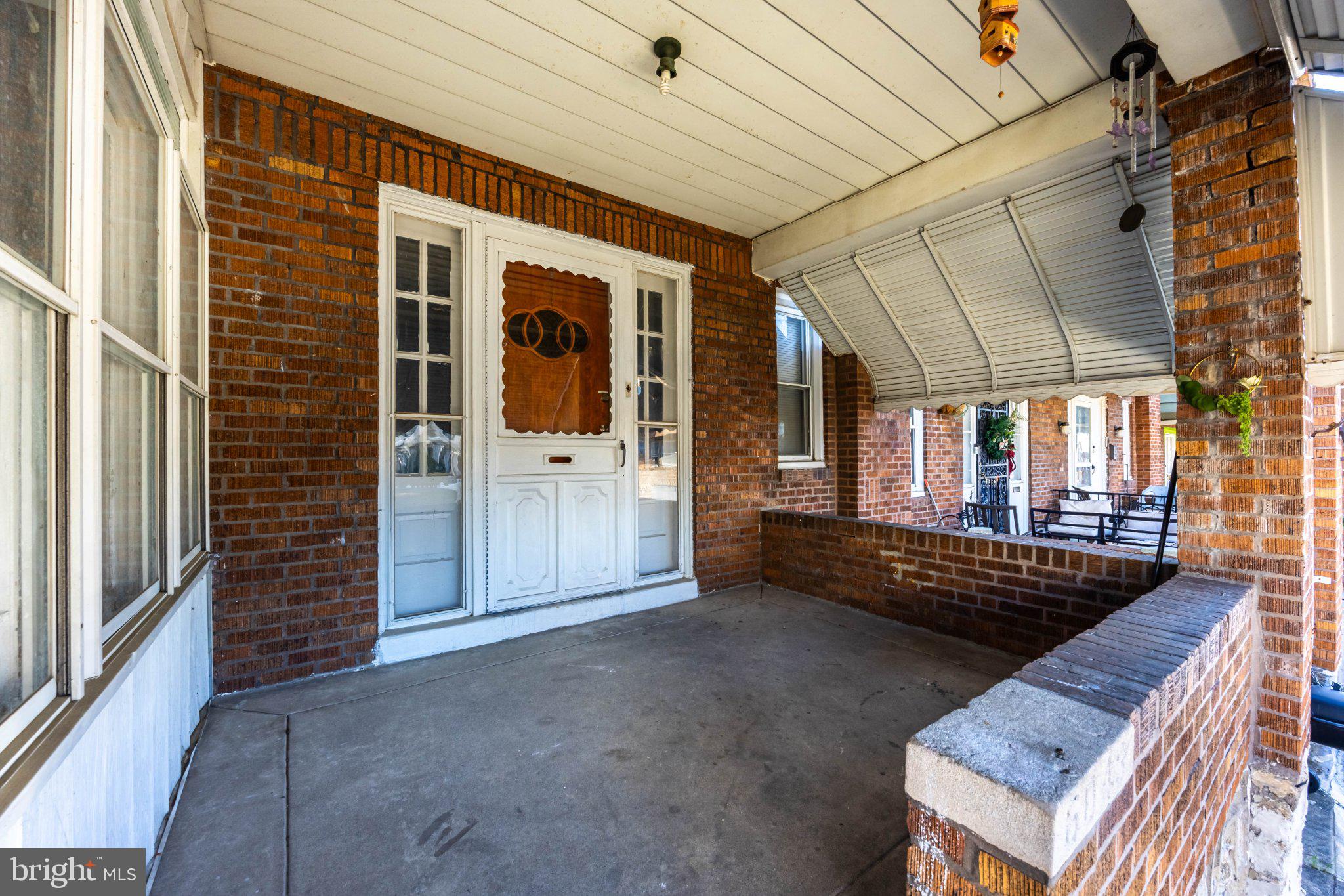6043 North 3rd Street Philadelphia, PA 19120 - Photo 1 of 27 Charming brick porch with inviting entry.