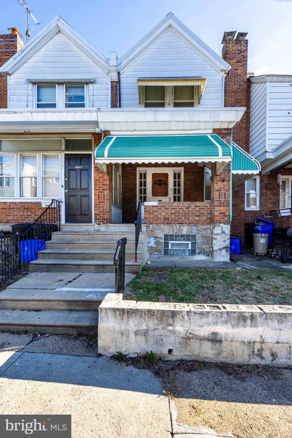 6043 North 3rd Street Philadelphia, PA 19120 - Photo 2 of 27 Charming brick home with awning.