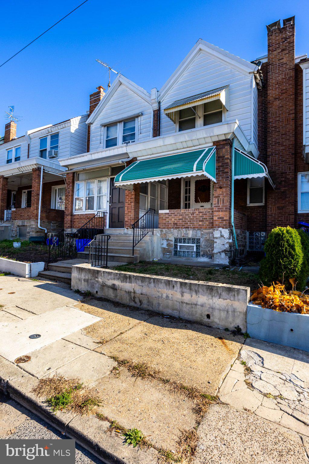 6043 North 3rd Street Philadelphia, PA 19120 - Photo 27 of 27 Charming brick home with awning.