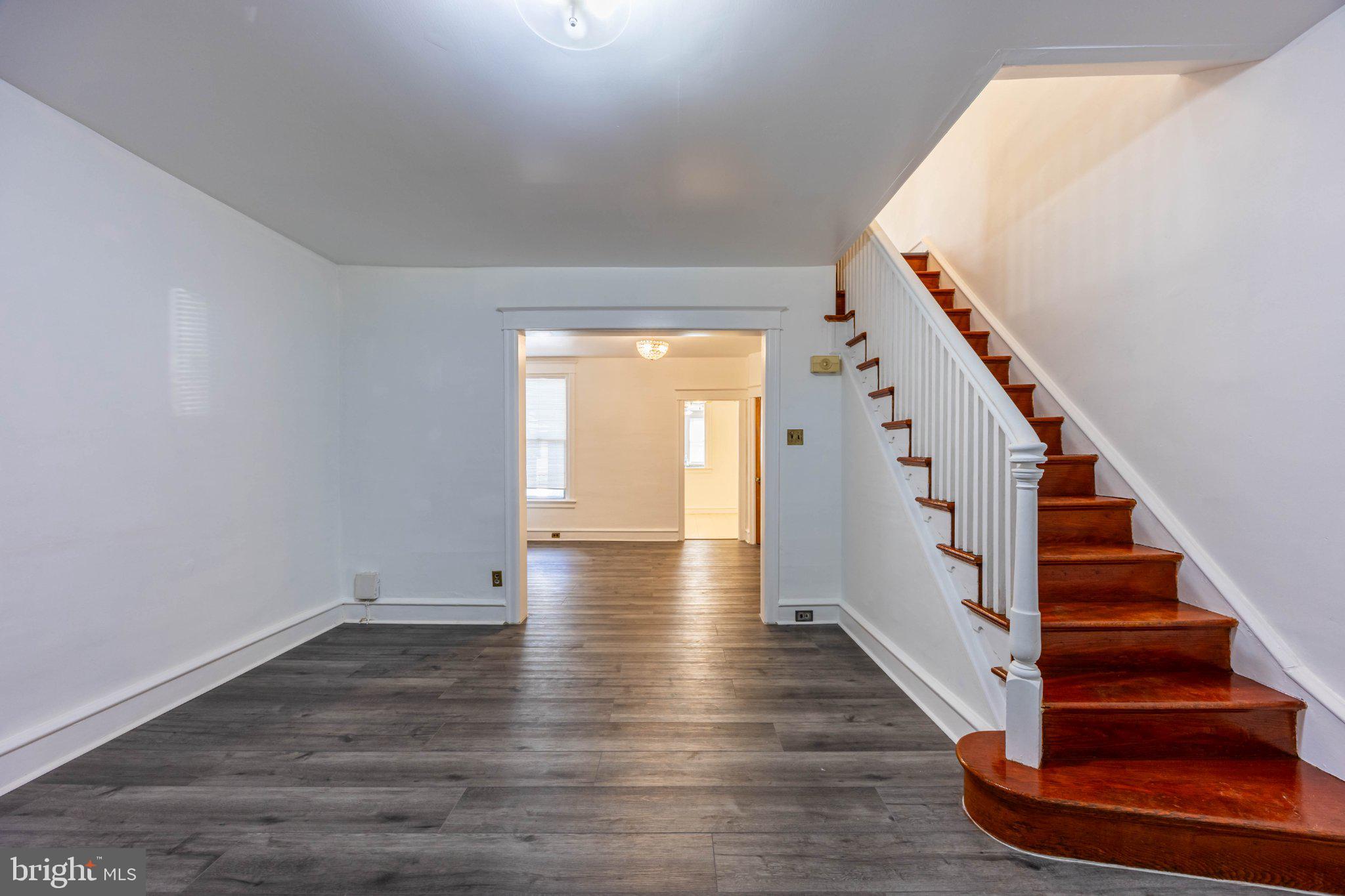6043 North 3rd Street Philadelphia, PA 19120 - Photo 5 of 27 Bright, inviting space with elegant stairs.