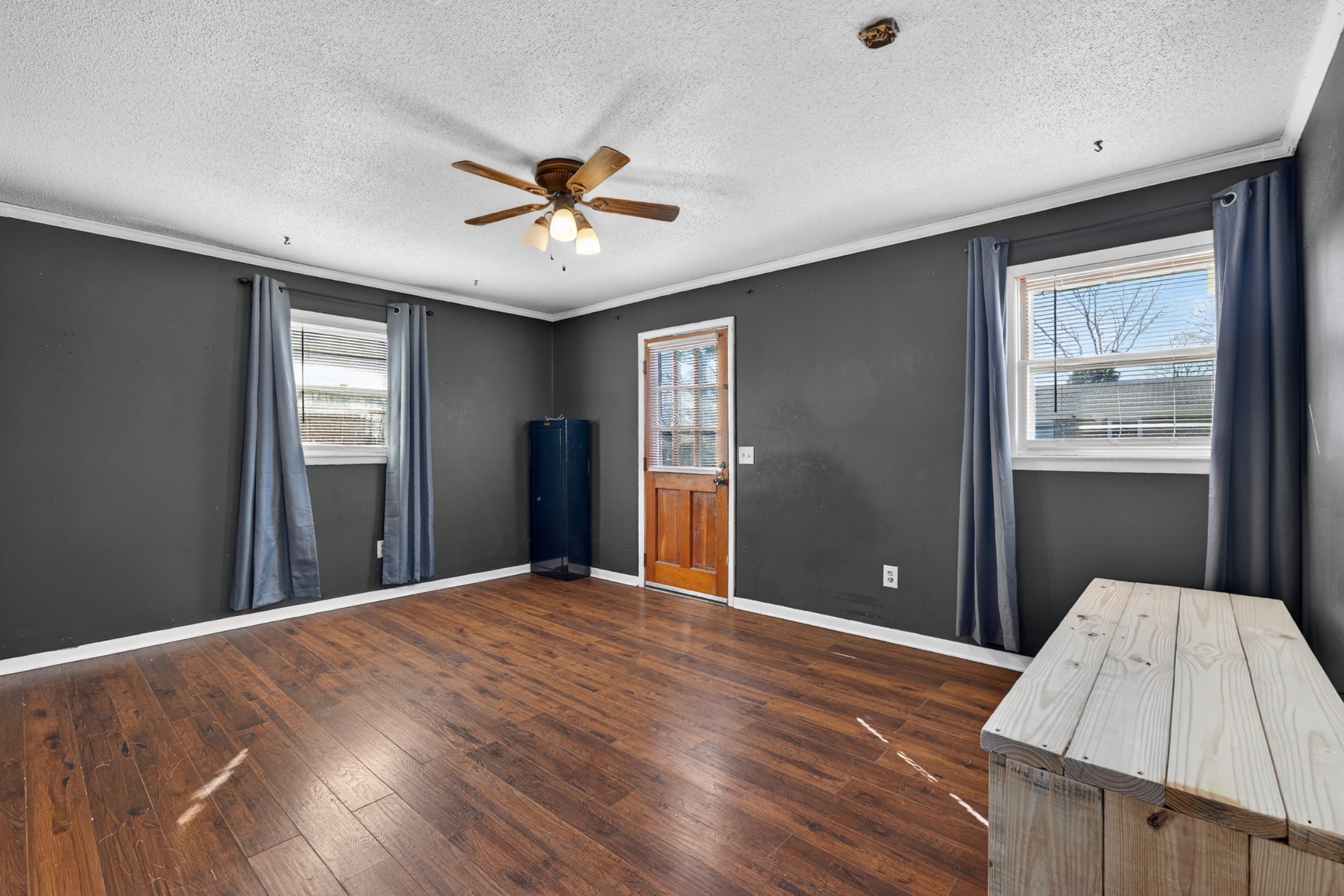 3 Park City Heights Road Fayetteville, TN 37334 - Photo 18 of 32 a view of a livingroom with a chandelier fan and windows