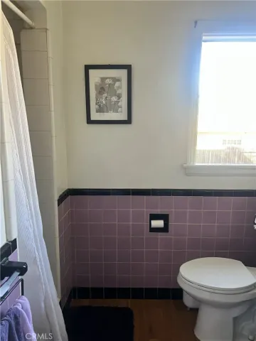 a bathroom with a toilet