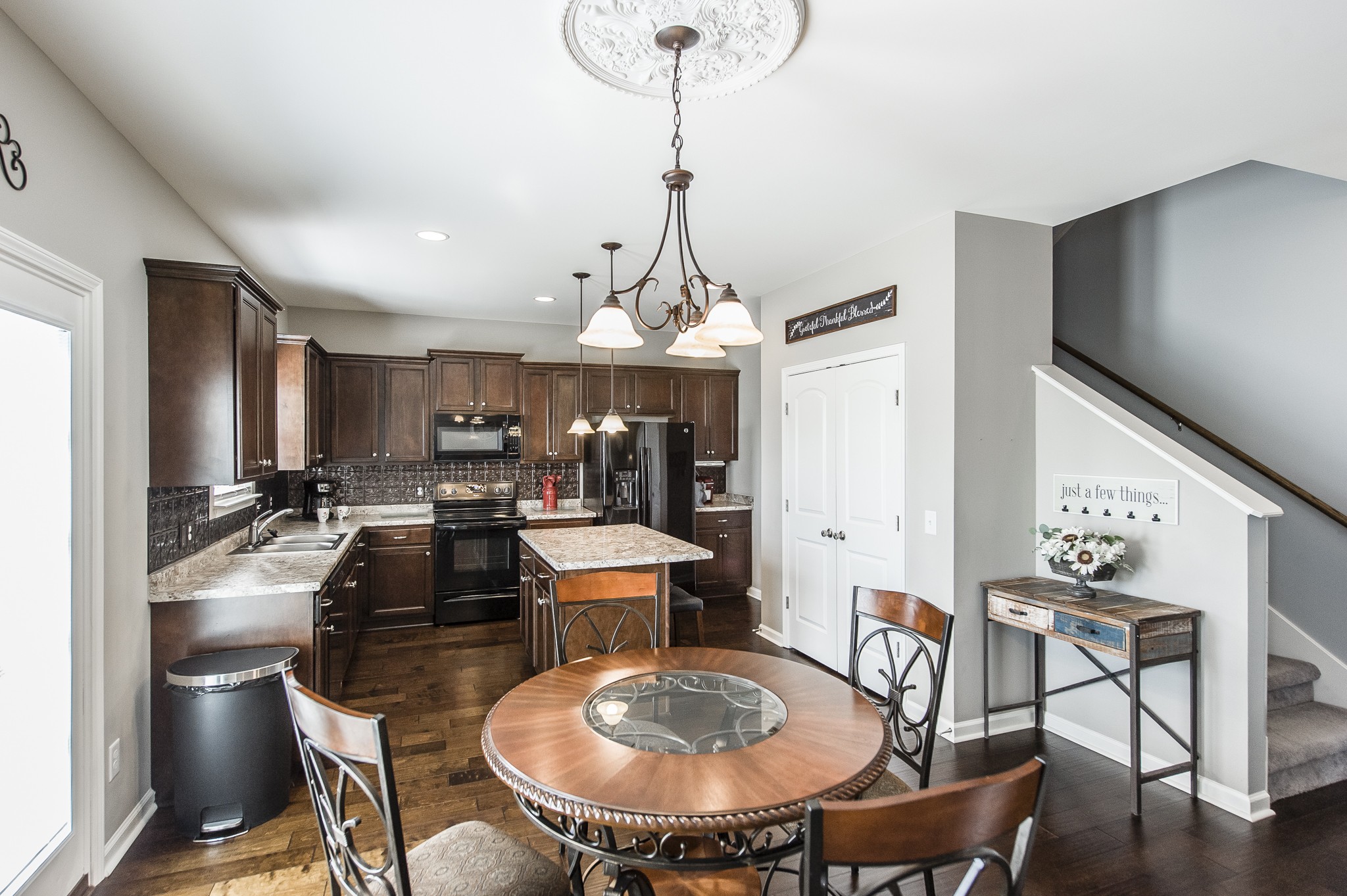 114 Monteview Drive Hendersonville, TN 37075 - Photo 14 of 42 a view of a dining room with furniture window and wooden floor