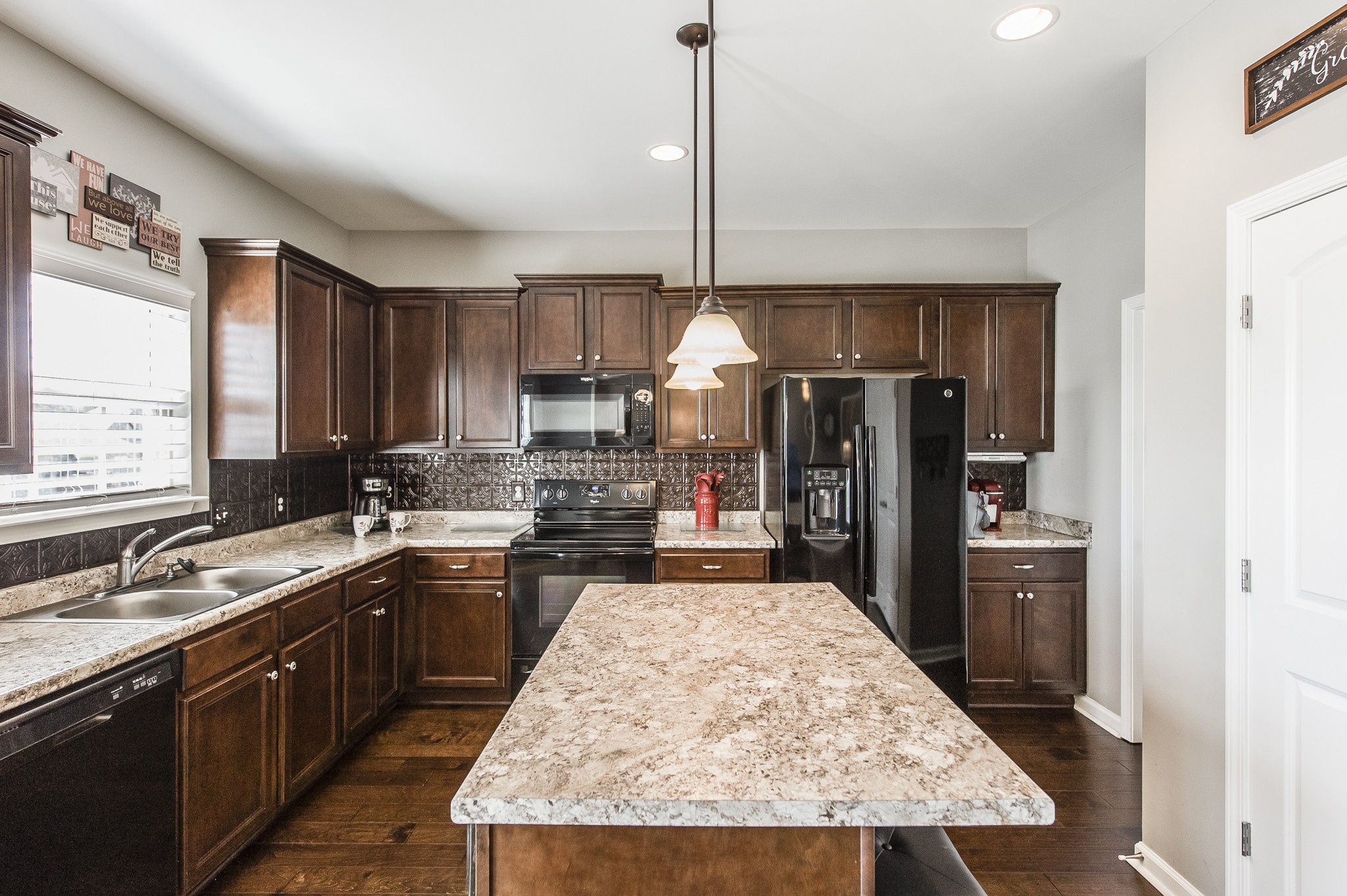 114 Monteview Drive Hendersonville, TN 37075 - Photo 17 of 42 a kitchen with stainless steel appliances granite countertop sink stove and refrigerator