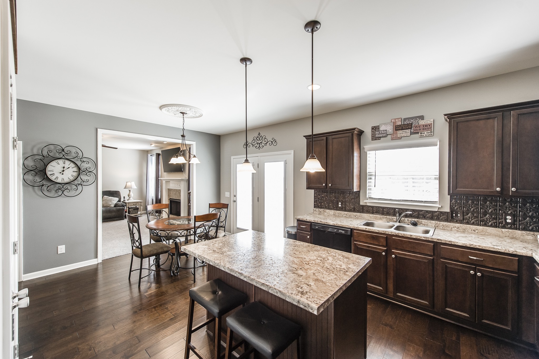 114 Monteview Drive Hendersonville, TN 37075 - Photo 21 of 42 a kitchen with center island table and chairs
