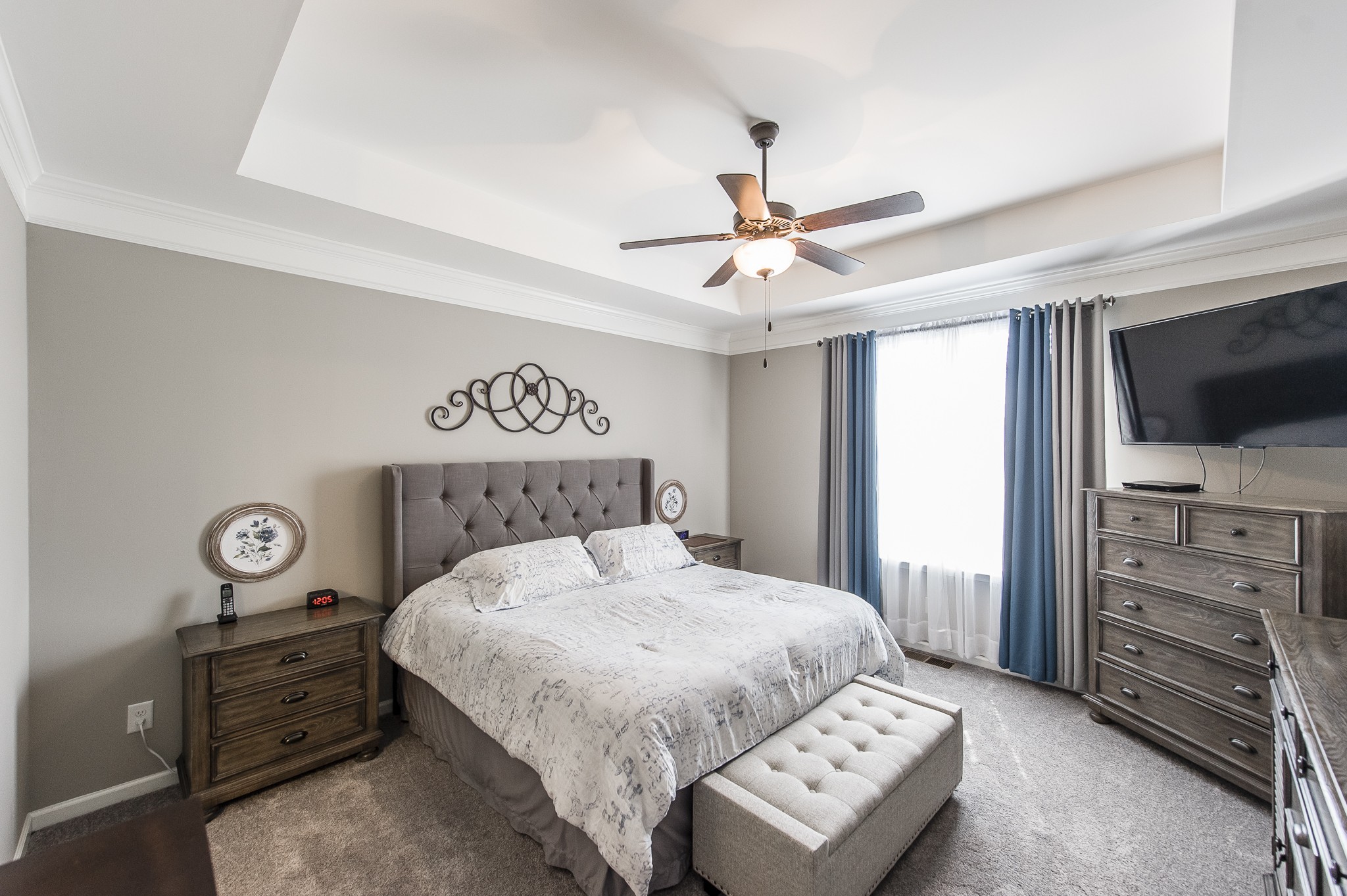 114 Monteview Drive Hendersonville, TN 37075 - Photo 23 of 42 a bedroom with a bed and a tv on the dresser